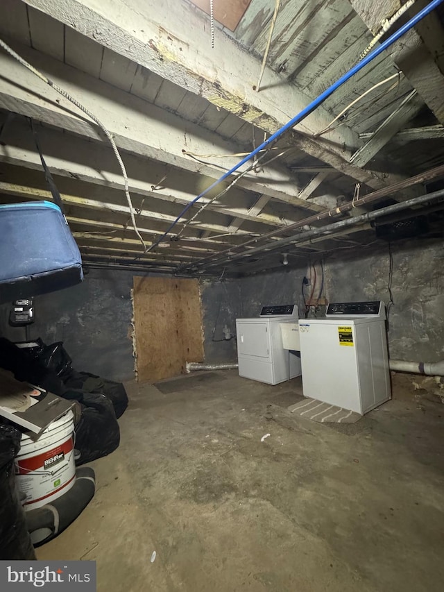 basement featuring washing machine and dryer