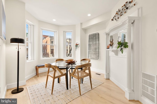 dining room with light hardwood / wood-style flooring