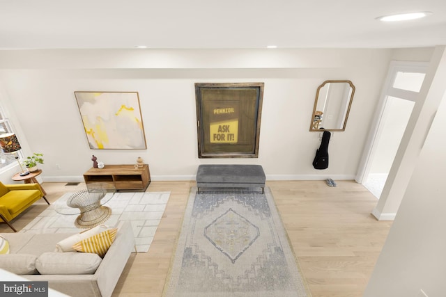 sitting room featuring light wood-type flooring