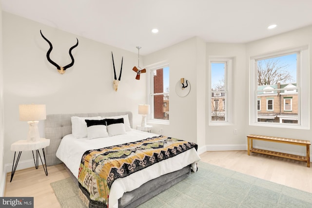 bedroom with light hardwood / wood-style floors