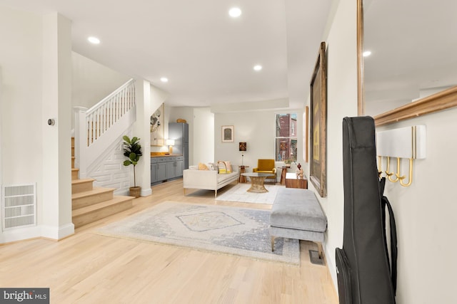 living room with light hardwood / wood-style floors