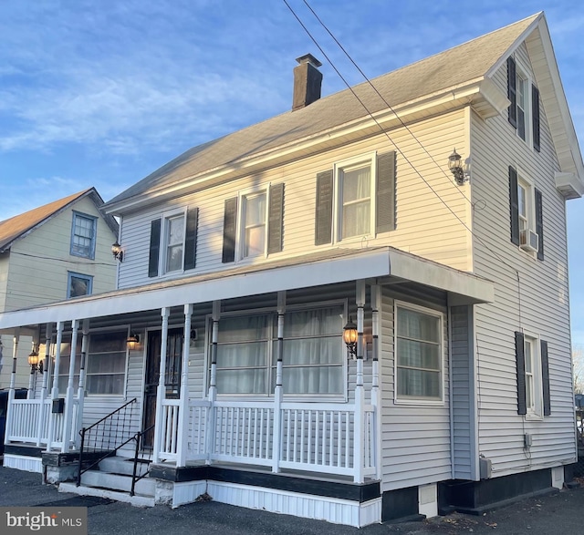 view of front of home featuring covered porch