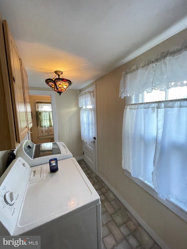 211 W 6th St, Laurel, DE 19956 - washroom with independent washer and dryer and brick patterned floors