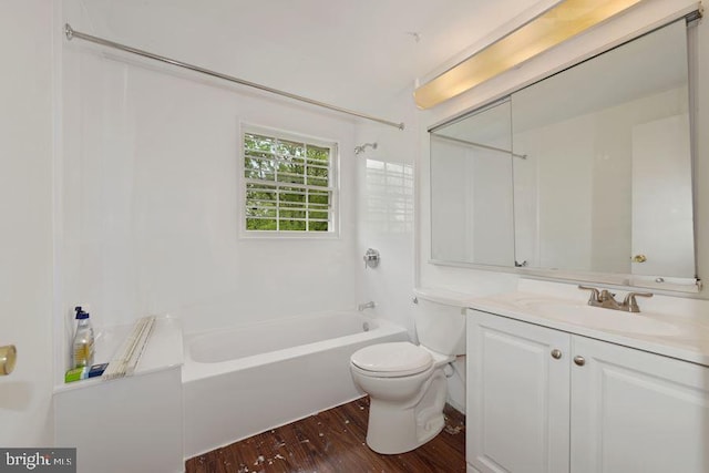 full bathroom with shower / bathing tub combination, hardwood / wood-style floors, vanity, and toilet