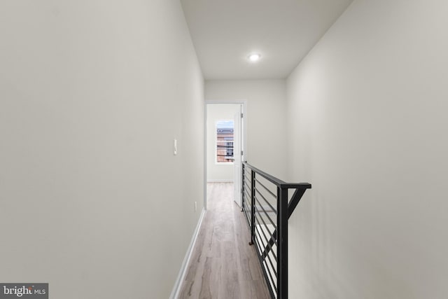 hallway featuring light hardwood / wood-style flooring