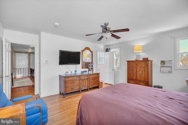 bedroom featuring ceiling fan and light hardwood / wood-style flooring