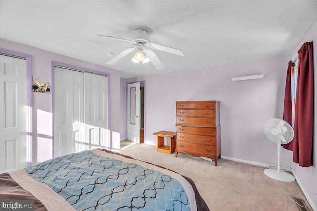 bedroom with light carpet and ceiling fan