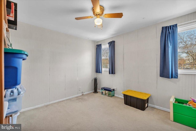 playroom featuring carpet flooring and ceiling fan