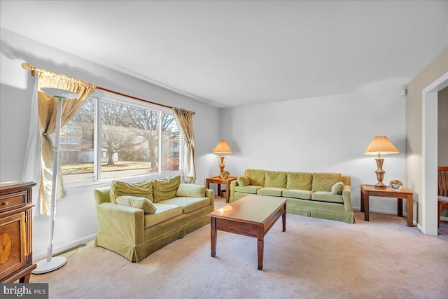 living room featuring light colored carpet