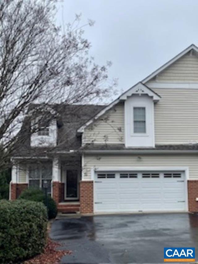 view of front of property featuring a garage