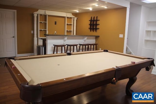 rec room featuring bar, dark wood-type flooring, and billiards