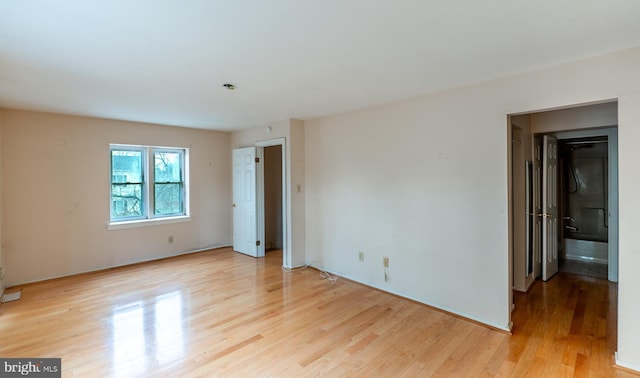 empty room featuring light hardwood / wood-style floors