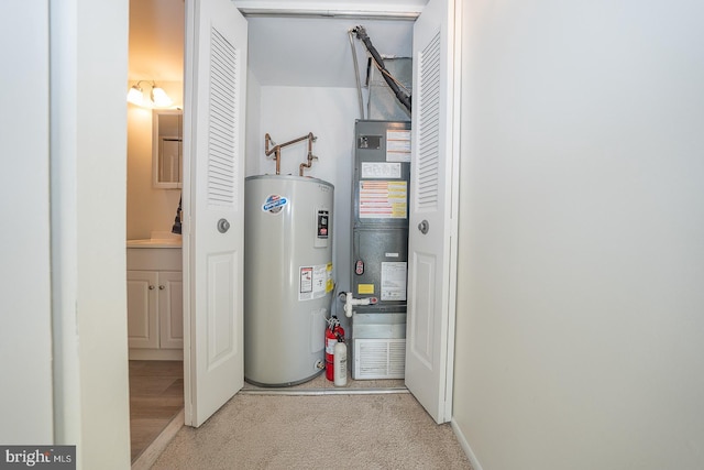 utilities featuring heating unit and electric water heater