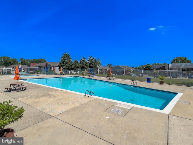 view of pool with a patio