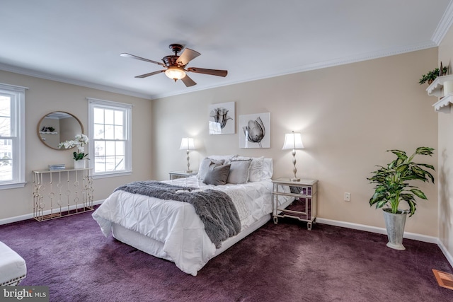 bedroom with dark colored carpet, ceiling fan, and ornamental molding