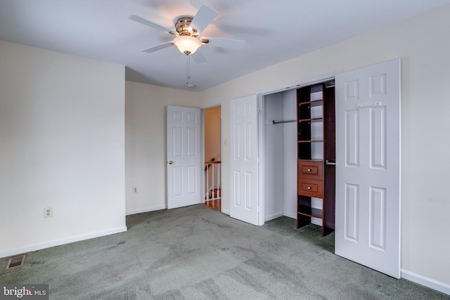 unfurnished bedroom with ceiling fan, a closet, and light colored carpet