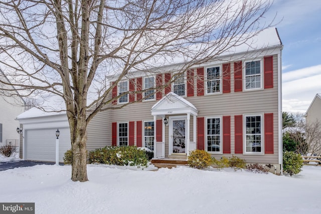 colonial house featuring a garage