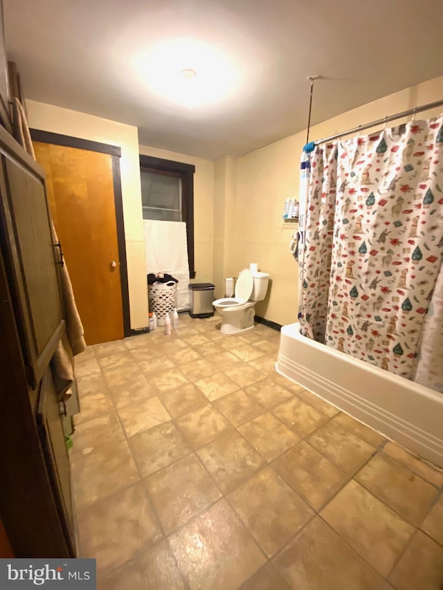 bathroom with toilet and shower / bathtub combination with curtain