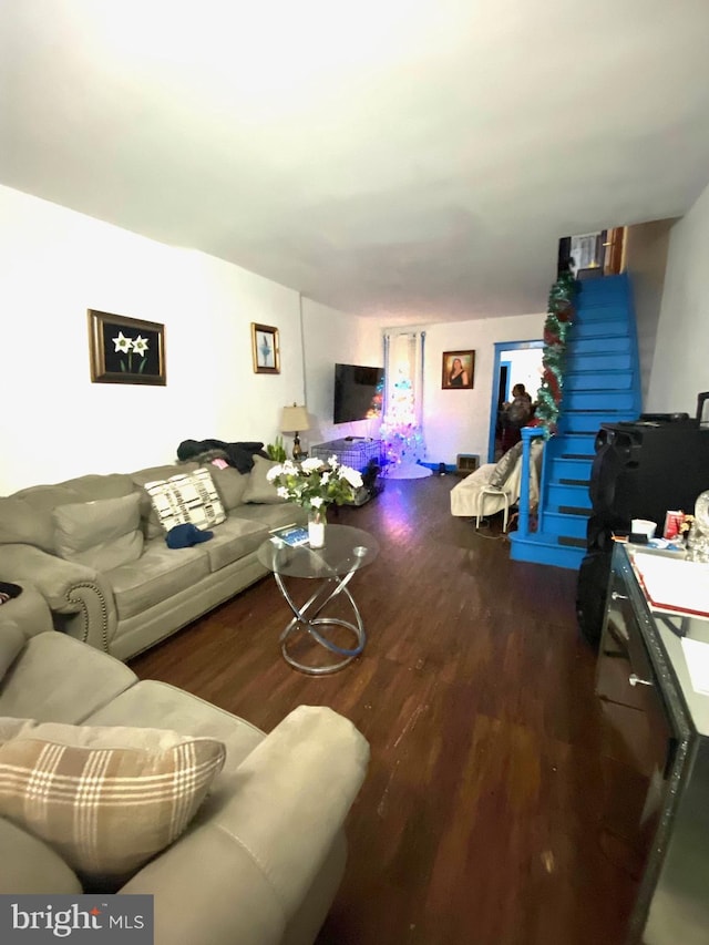 living room featuring dark hardwood / wood-style floors