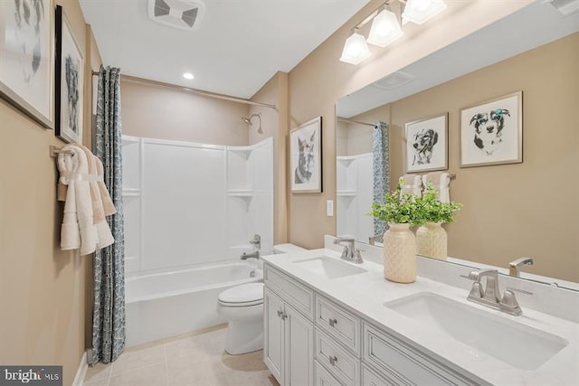 full bathroom with tile patterned floors, vanity, shower / bath combination with curtain, and toilet