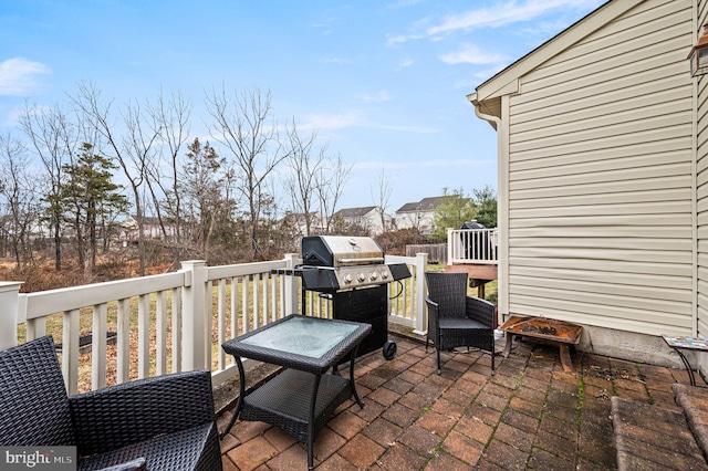 view of patio featuring a grill