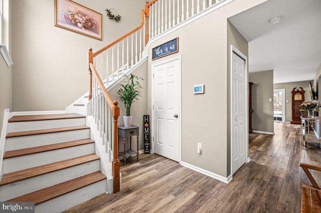 entryway with wood-type flooring