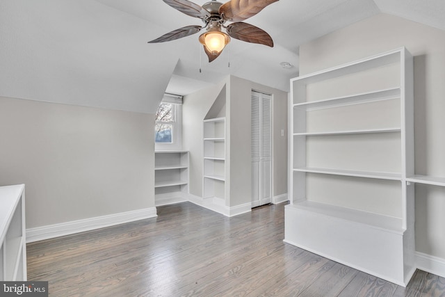 additional living space with lofted ceiling, wood-type flooring, and ceiling fan