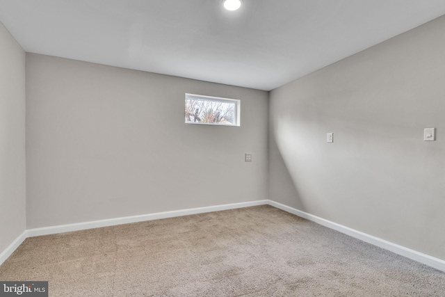 empty room featuring carpet flooring