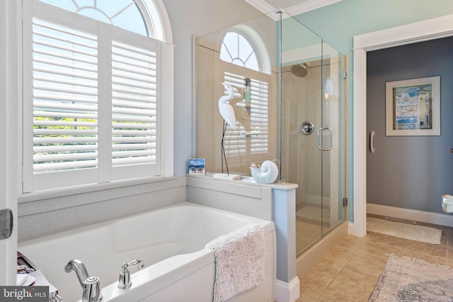 bathroom featuring ornamental molding, tile patterned floors, and plus walk in shower