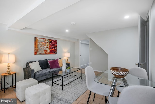 living area with light tile patterned floors, recessed lighting, and baseboards