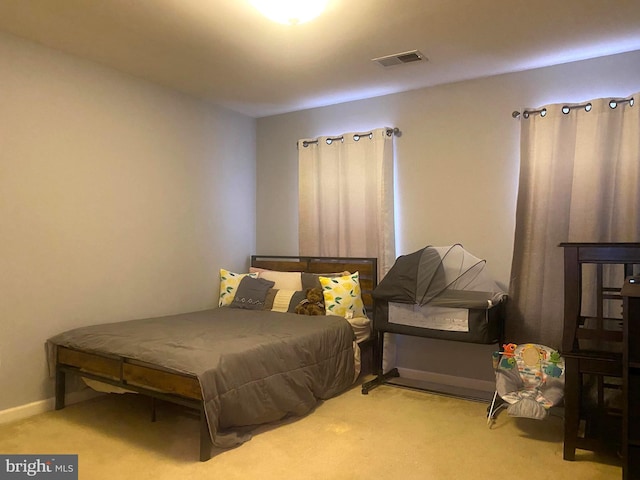 carpeted bedroom with billiards