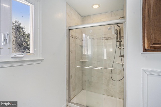 bathroom with an enclosed shower