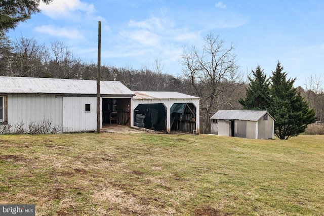 view of outdoor structure with a lawn