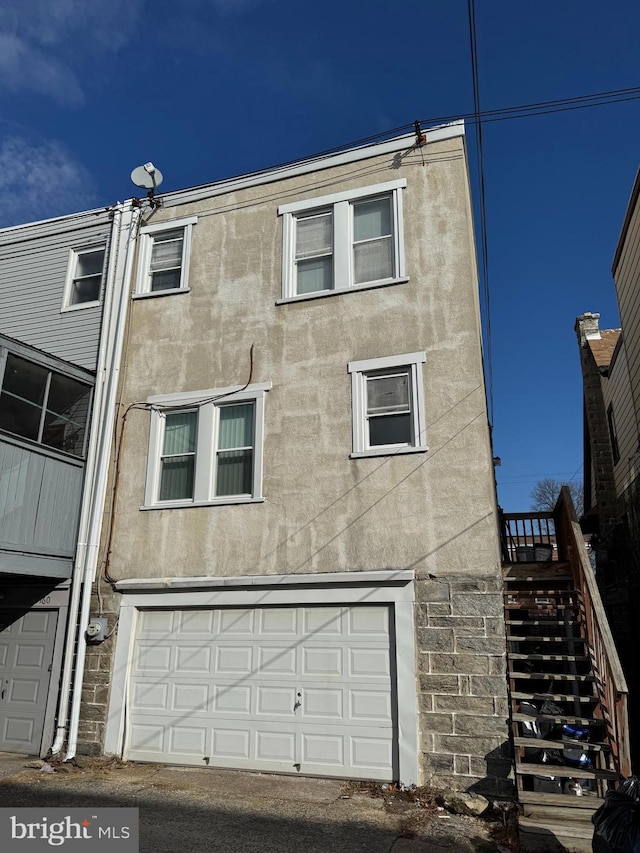 exterior space featuring a garage