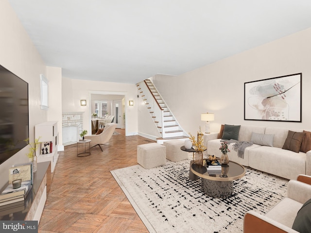 living room featuring light parquet floors