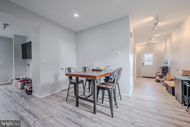 dining area with light wood-type flooring