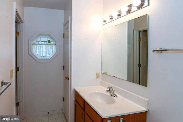 bathroom with vanity and tile patterned floors