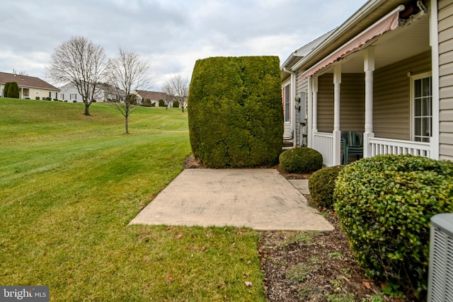 view of yard with central AC unit