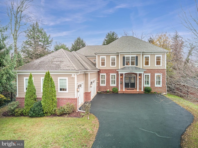 view of front of home with a front yard