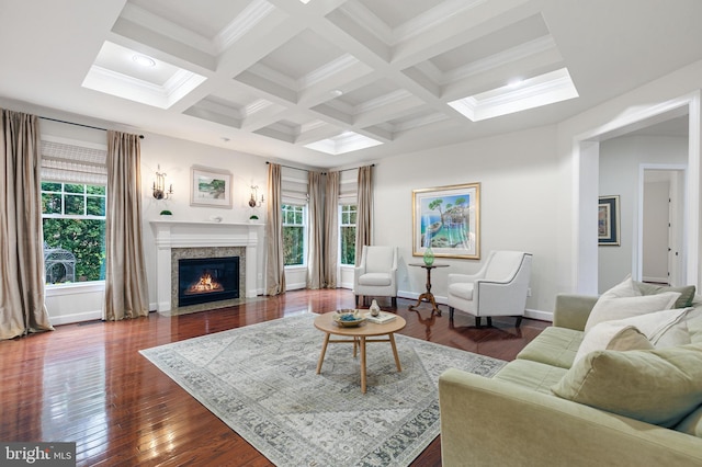 living room with beam ceiling, dark hardwood / wood-style flooring, a high end fireplace, and coffered ceiling