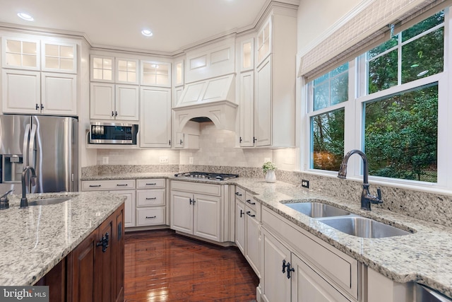 kitchen with white cabinetry, sink, dark wood-type flooring, and appliances with stainless steel finishes