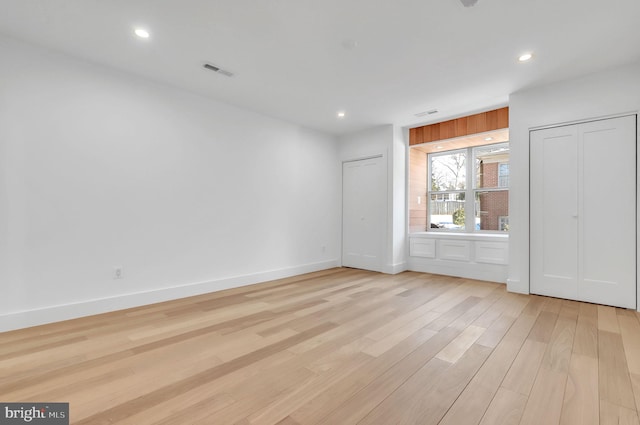 empty room featuring light hardwood / wood-style floors