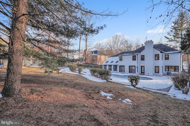 view of yard covered in snow