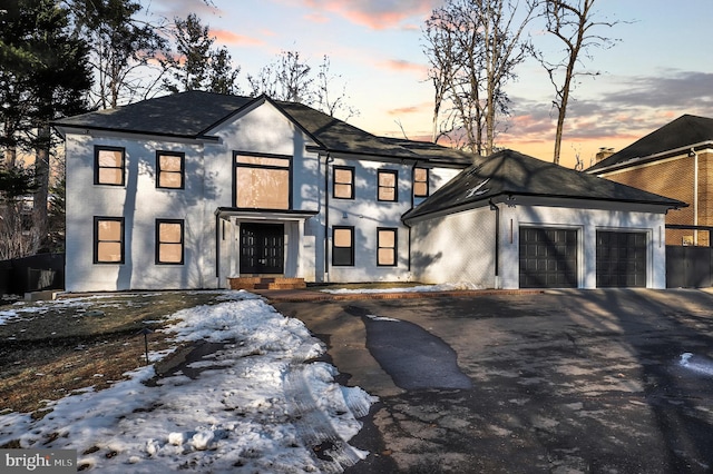 view of front of property featuring a garage