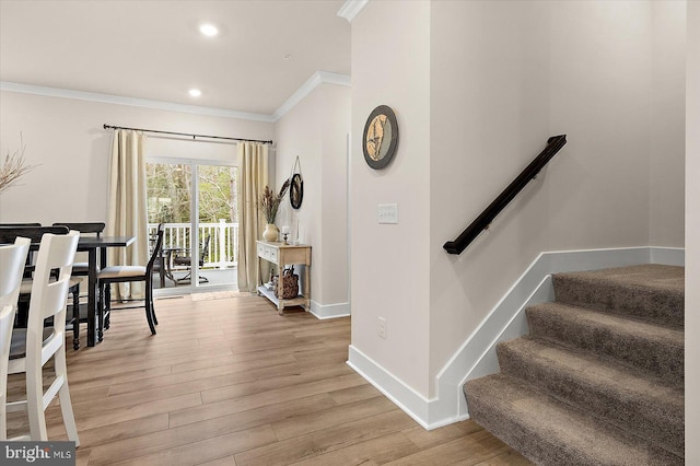 interior space featuring light hardwood / wood-style flooring and ornamental molding