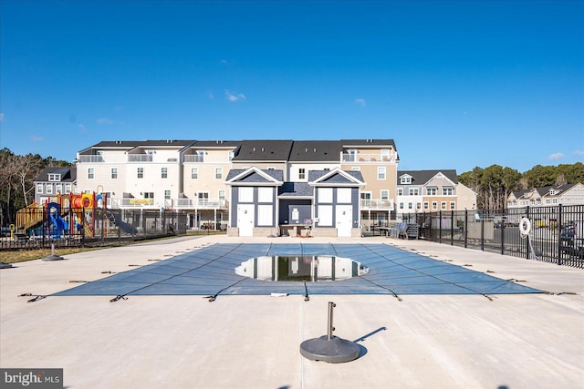 view of swimming pool featuring a patio area