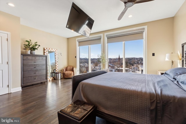 bedroom with access to exterior, ceiling fan, and dark hardwood / wood-style floors