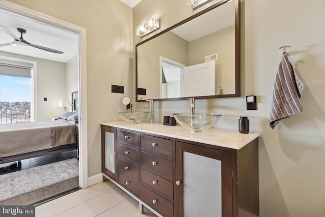 bathroom with vanity, hardwood / wood-style flooring, and ceiling fan