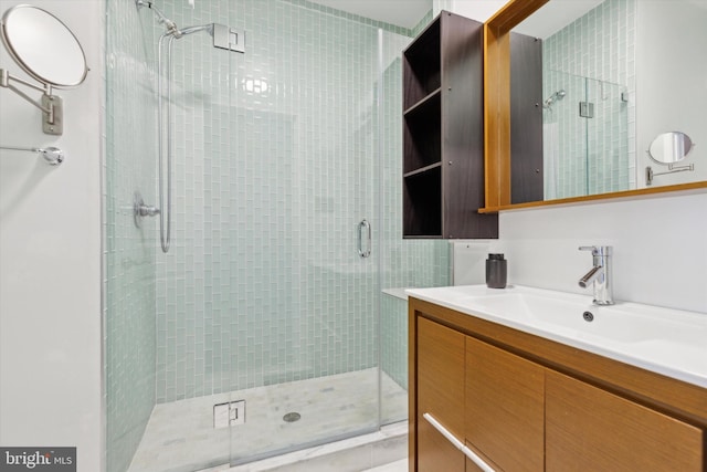 bathroom featuring vanity and walk in shower