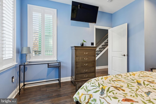 bedroom featuring dark hardwood / wood-style floors